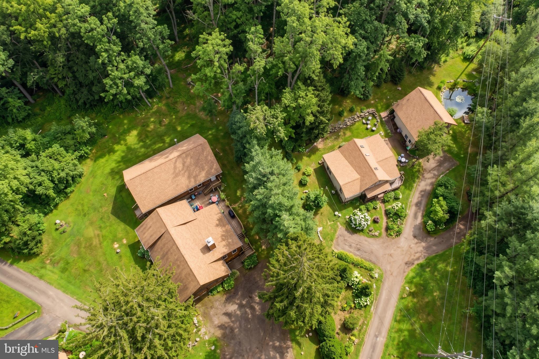 88 Gravelly Run Road McHenry, MD 21541 - Photo 7 of 79 an aerial view of a house with a yard and lake view