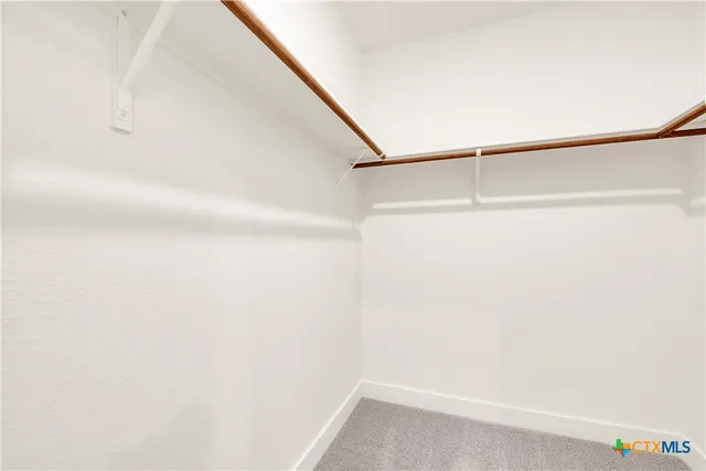 a view of small space with racks on the wall