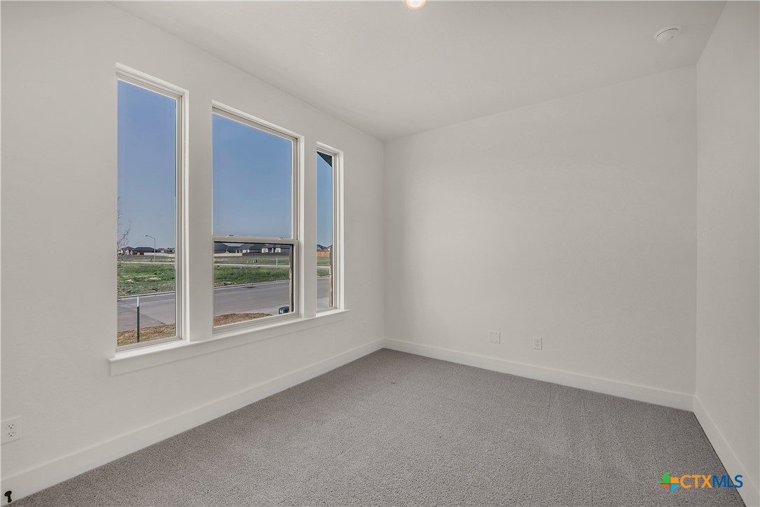 8909 Ponderosa Pine Road Temple, TX 76502 - Photo 12 of 16 an empty room with a window