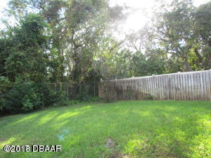 99 Mayfield Circle Ormond Beach, FL 32174 - Photo 25 of 28 a view of a back yard