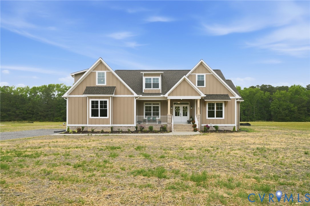 67 Hicks Wharf Road Cardinal, VA 23025 - Photo 1 of 50 a front view of a house with a yard