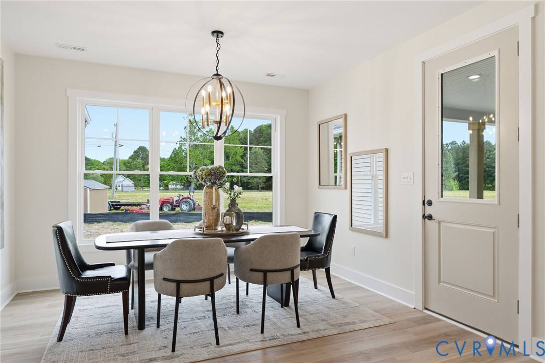 67 Hicks Wharf Road Cardinal, VA 23025 - Photo 15 of 50 a view of a dining room with furniture window and outside view