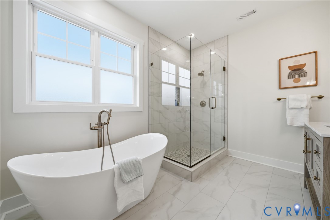 67 Hicks Wharf Road Cardinal, VA 23025 - Photo 20 of 50 a white bath tub sitting next to a shower