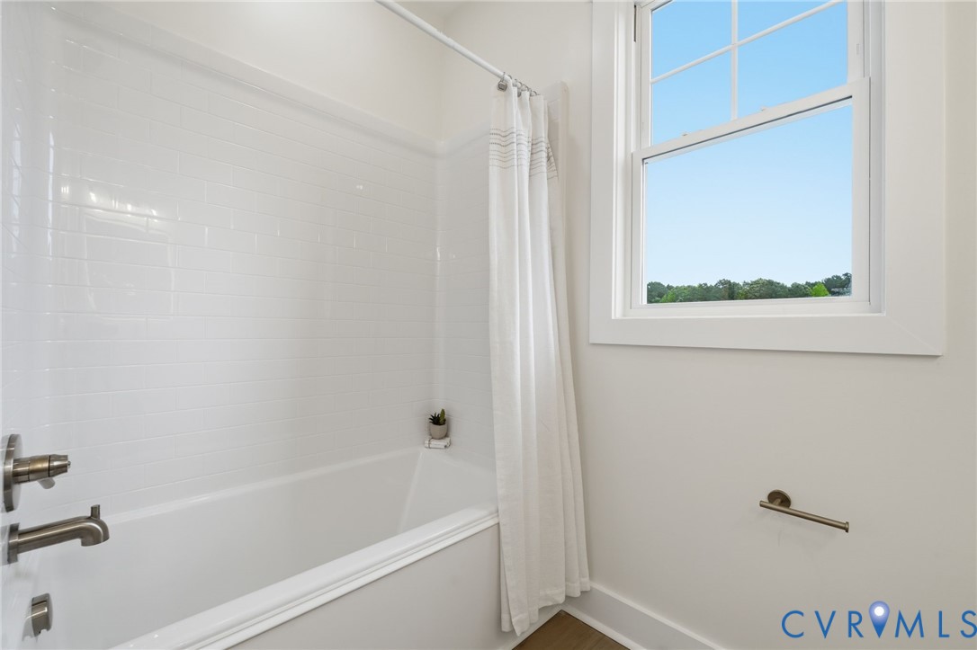 67 Hicks Wharf Road Cardinal, VA 23025 - Photo 29 of 50 a bathroom with a bathtub