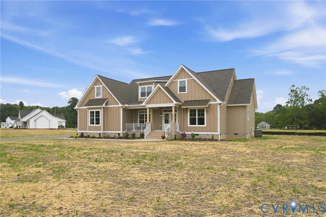 67 Hicks Wharf Road Cardinal, VA 23025 - Photo 43 of 50 a front view of a house with a yard