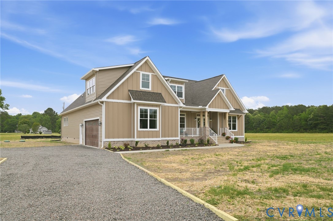 67 Hicks Wharf Road Cardinal, VA 23025 - Photo 44 of 50 a front view of a house with a yard