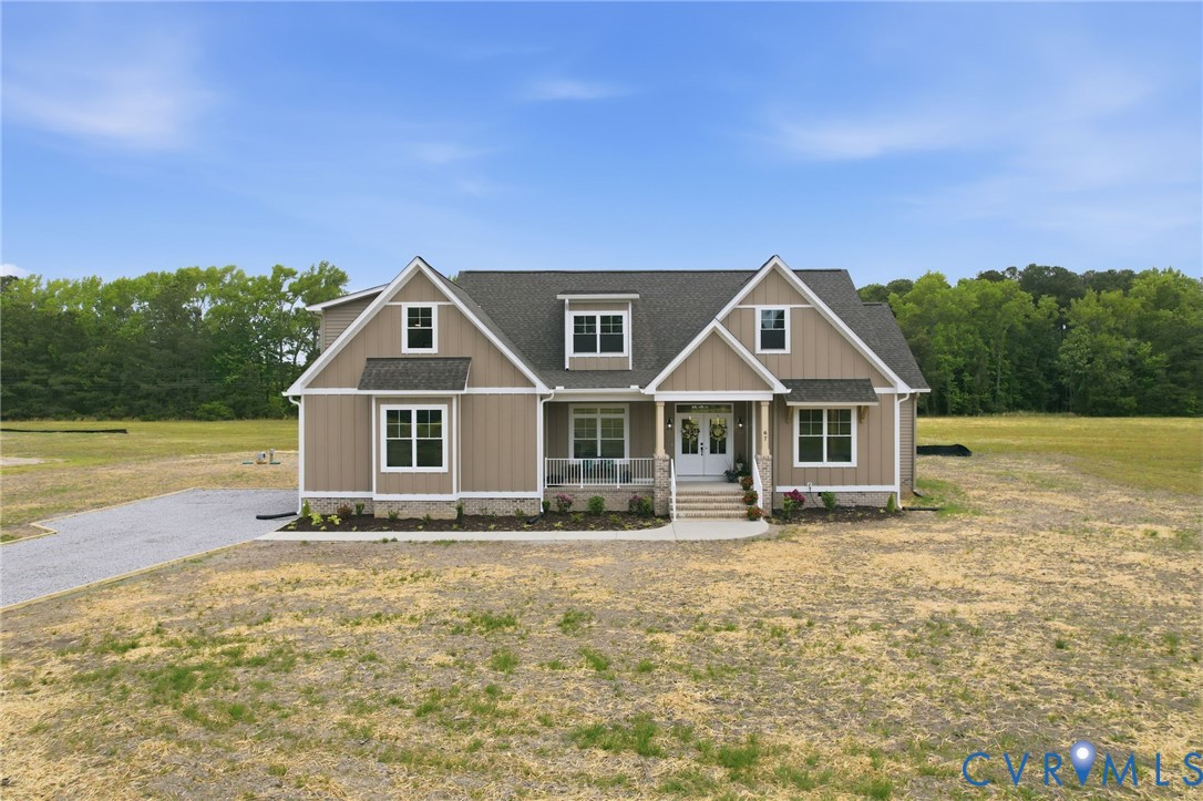 67 Hicks Wharf Road Cardinal, VA 23025 - Photo 50 of 50 a front view of a house with a yard