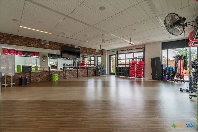 a view of a room with gym equipment
