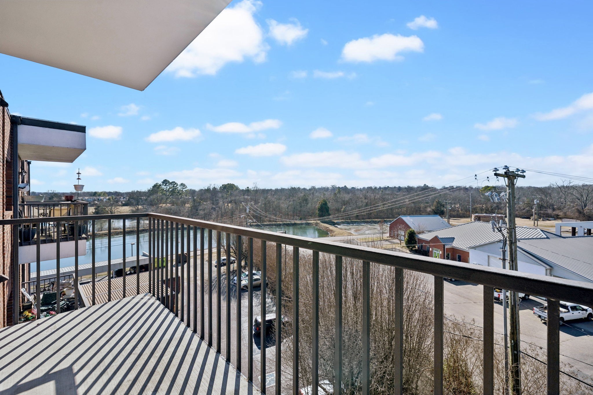 200 Sanders Ferry Road, Unit 2503 Hendersonville, TN 37075 - Photo 27 of 29 a view of a balcony with wooden fence