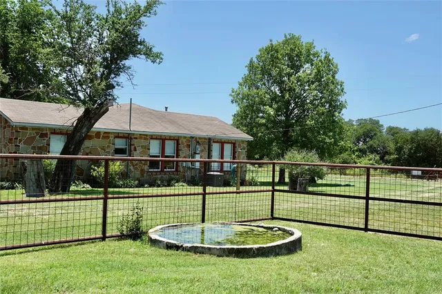 a house view with a garden space