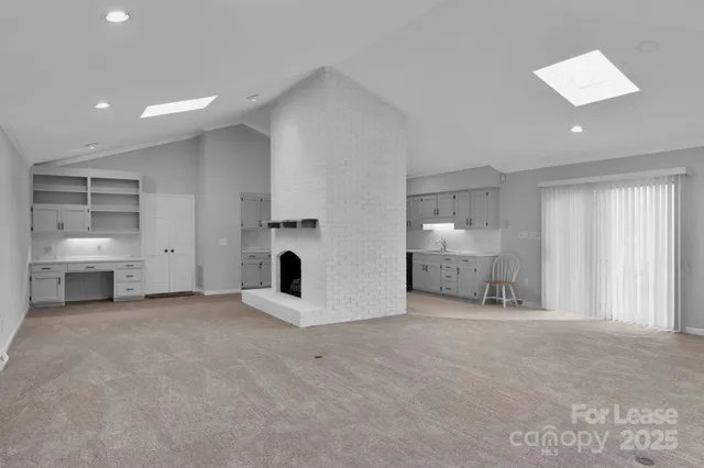 a view of a livingroom with a fireplace