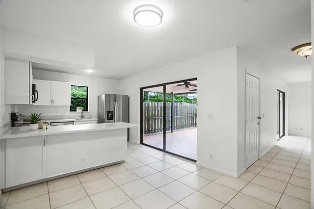 a large white room with mirror