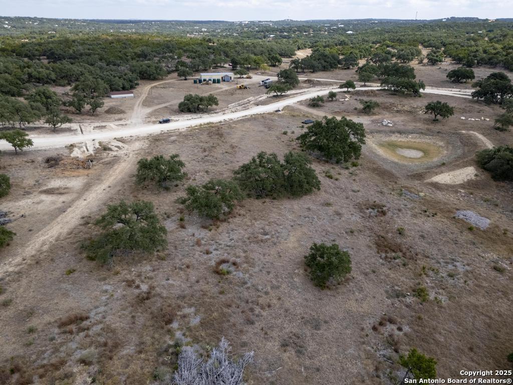 227 Mitchell Drive Spring Branch, TX 78070 - Photo 12 of 45 a view of a dry yard with lots of trees