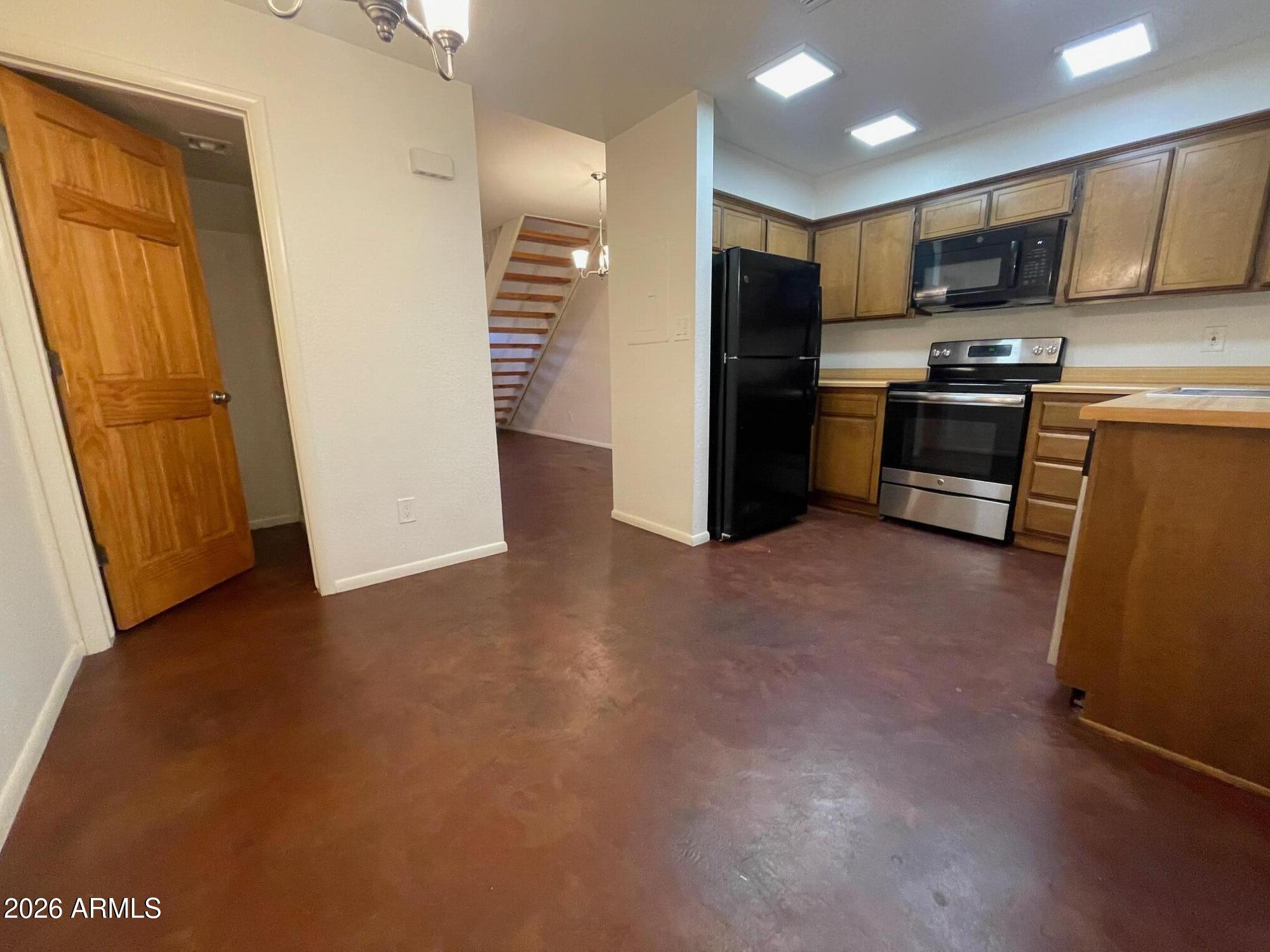 5830 North 10th Street, Unit 2 Phoenix, AZ 85014 - Photo 17 of 39 Kitchen w Half Bath downstairs
