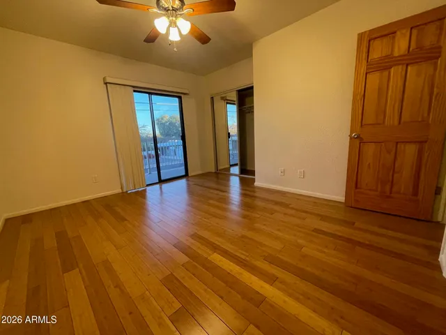 a view of city and mountain from a balcony