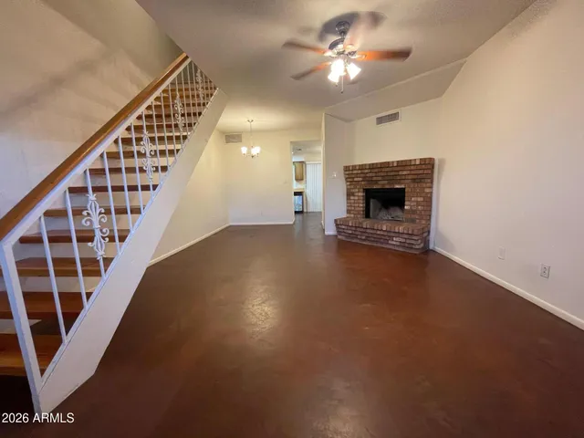 a view of a livingroom with wooden floor