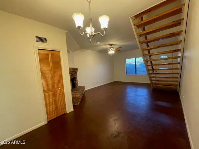 a bathroom with a sink mirror vanity and toilet