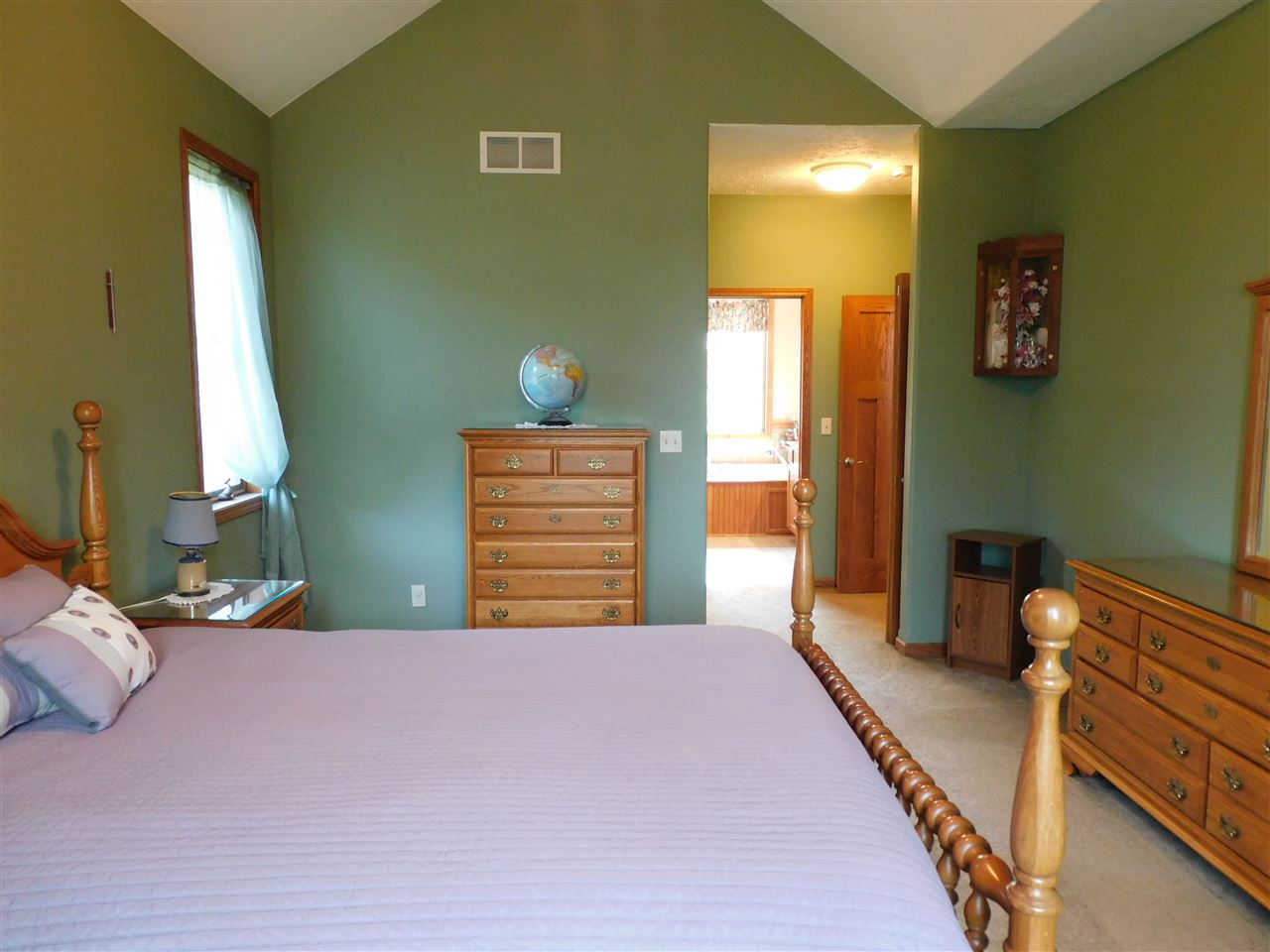 3265 Bloods Point Road Kirkland, IL 60146 - Photo 13 of 35 a bedroom with a bed and a window