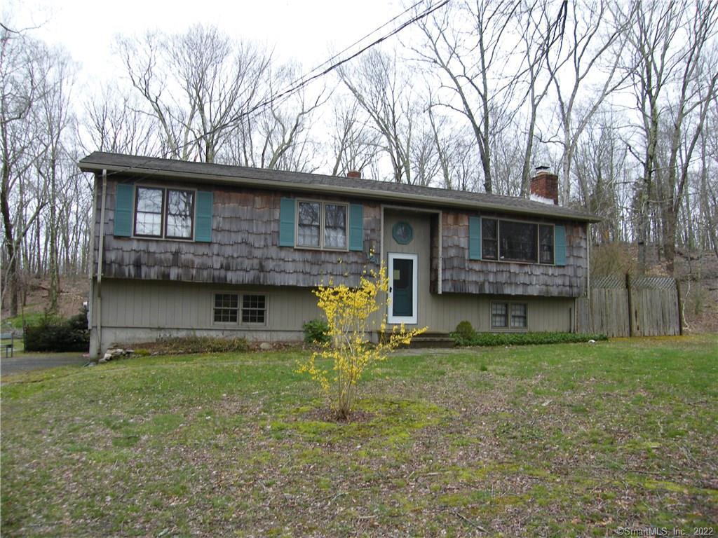 121 Ironworks Road Clinton, CT 06413 - Photo 1 of 1 a front view of a house with garden