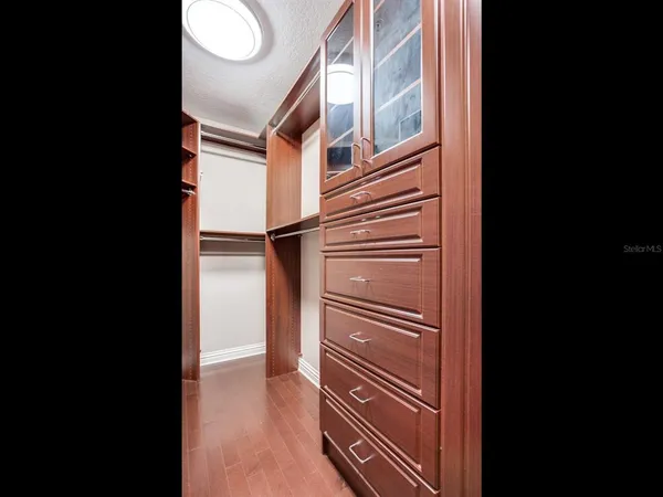 a bathroom with a mirror and a shower