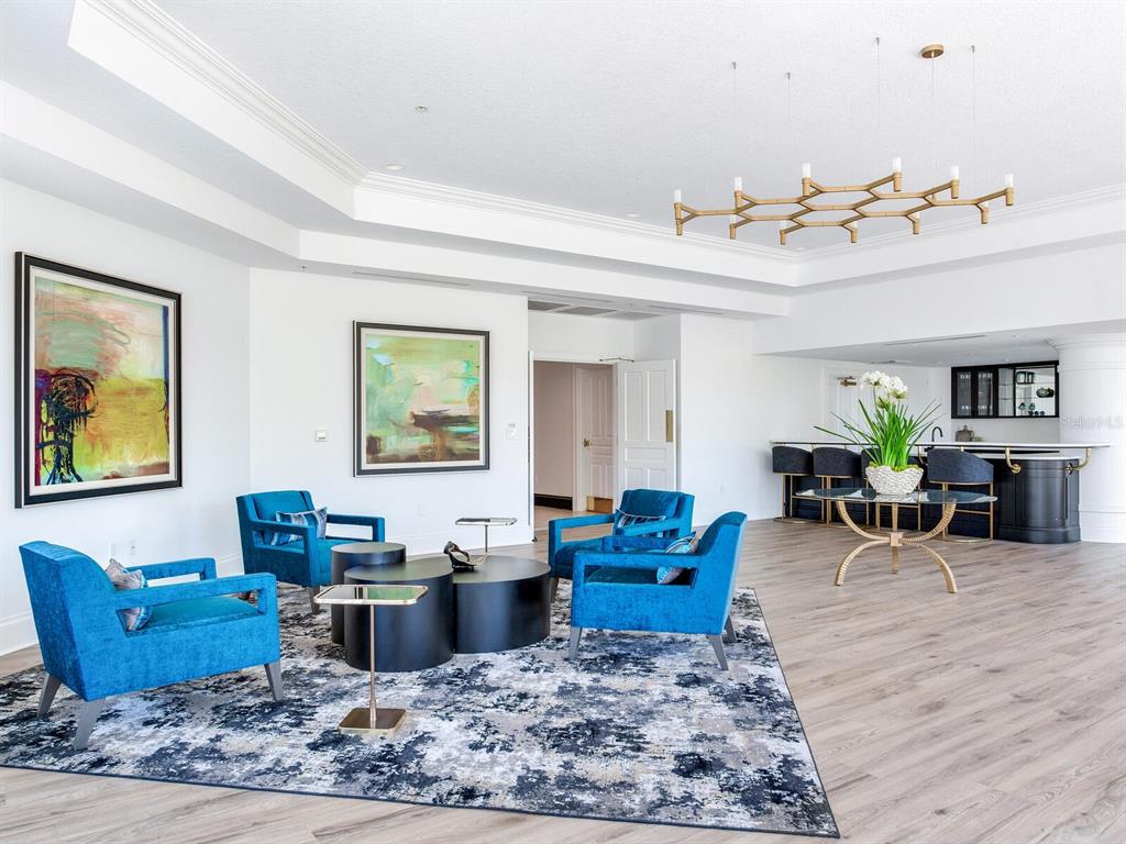 3507 Bayshore Boulevard, Unit 1202 Tampa, FL 33629 - Photo 58 of 68 a living room with furniture a rug and a potted plant
