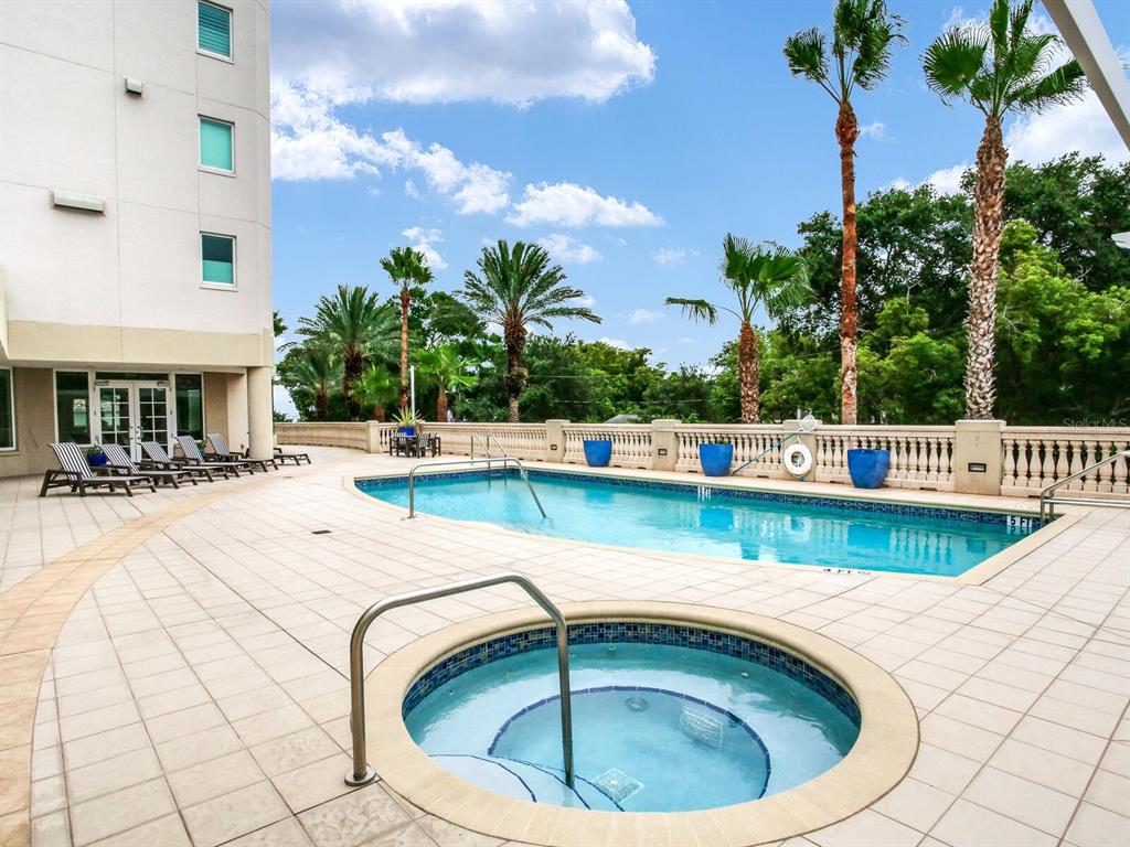 3507 Bayshore Boulevard, Unit 1202 Tampa, FL 33629 - Photo 67 of 68 a view of a swimming pool with a patio