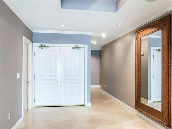 a view of kitchen with cabinets and wooden floor