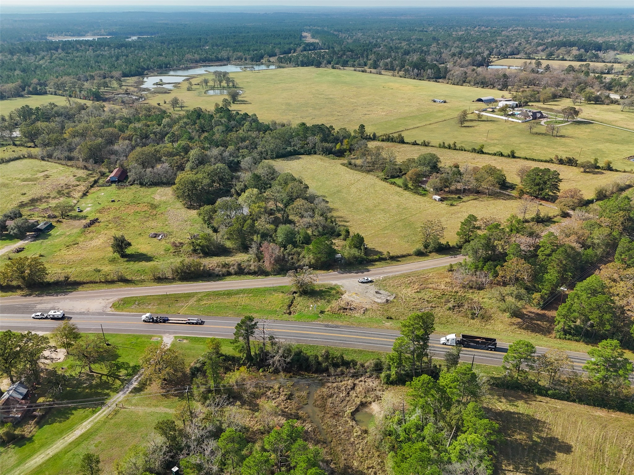 5515 North State Highway Trinity, TX 75862 - Photo 5 of 10 an aerial view of ocean beach and residential houses with outdoor space