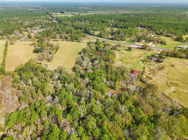 a view of a yard with an outdoor space