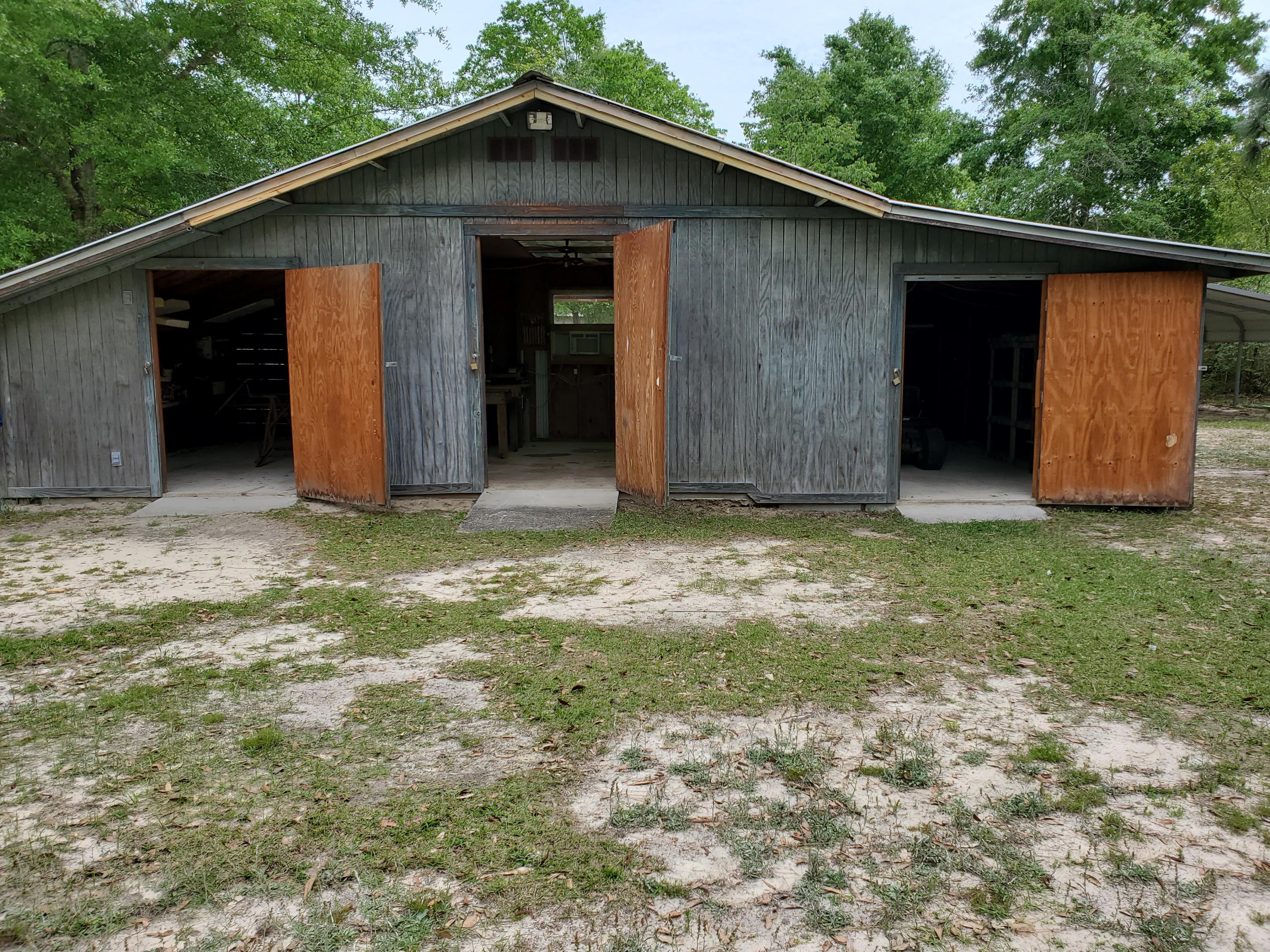 6197 Sundew Street Crestview, FL 32539 - Photo 29 of 34 34' x 18' Workshop