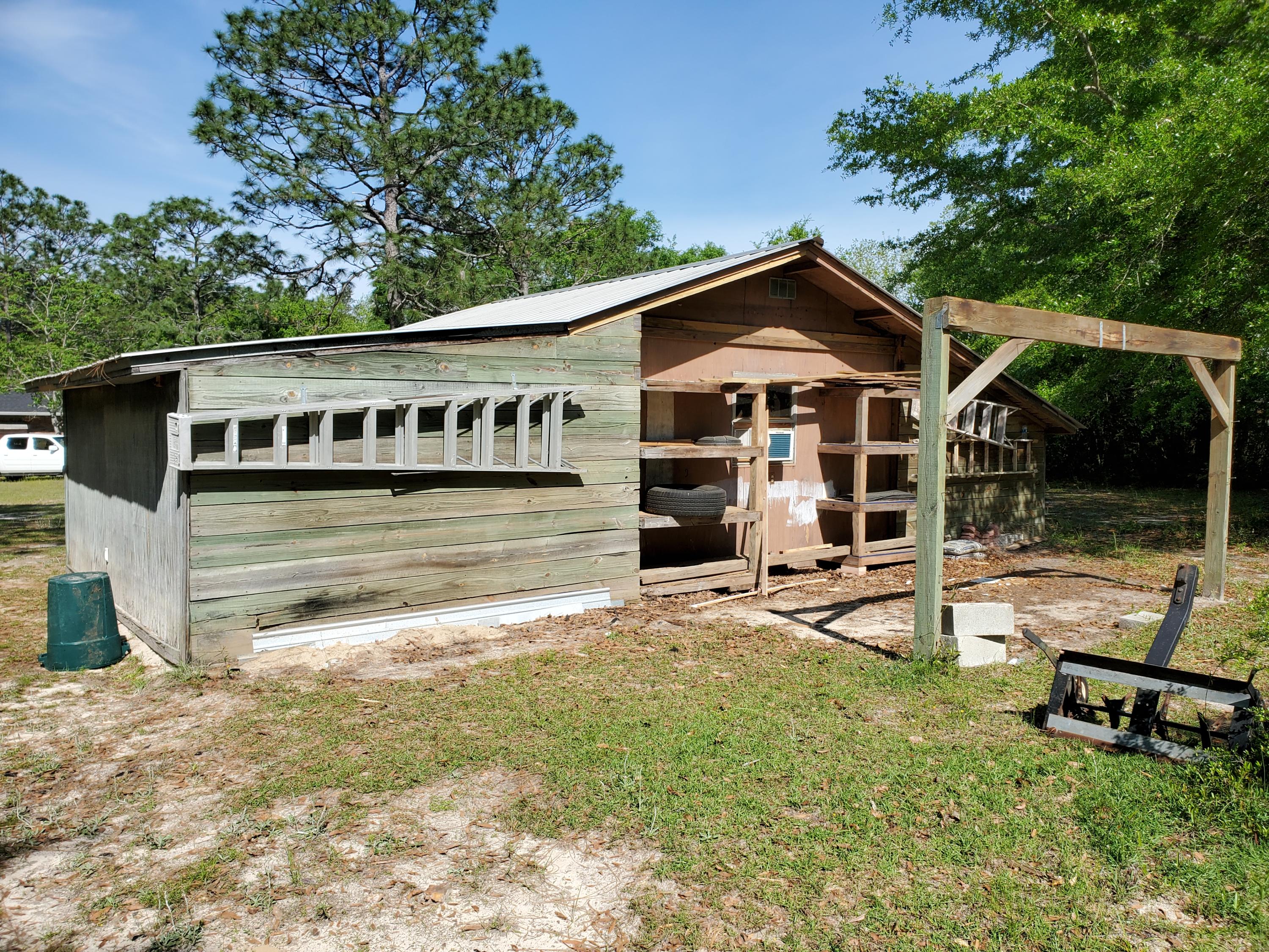 6197 Sundew Street Crestview, FL 32539 - Photo 30 of 34 Back of workshop