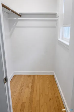 a kitchen with stainless steel appliances granite countertop a sink a stove a microwave and cabinets