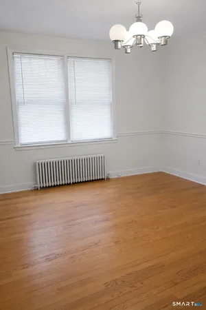 a view of kitchen with furniture and window