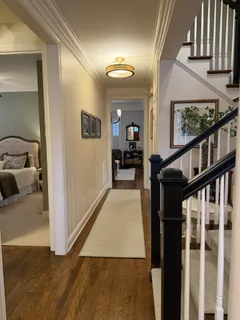 a view of a hallway view with living room