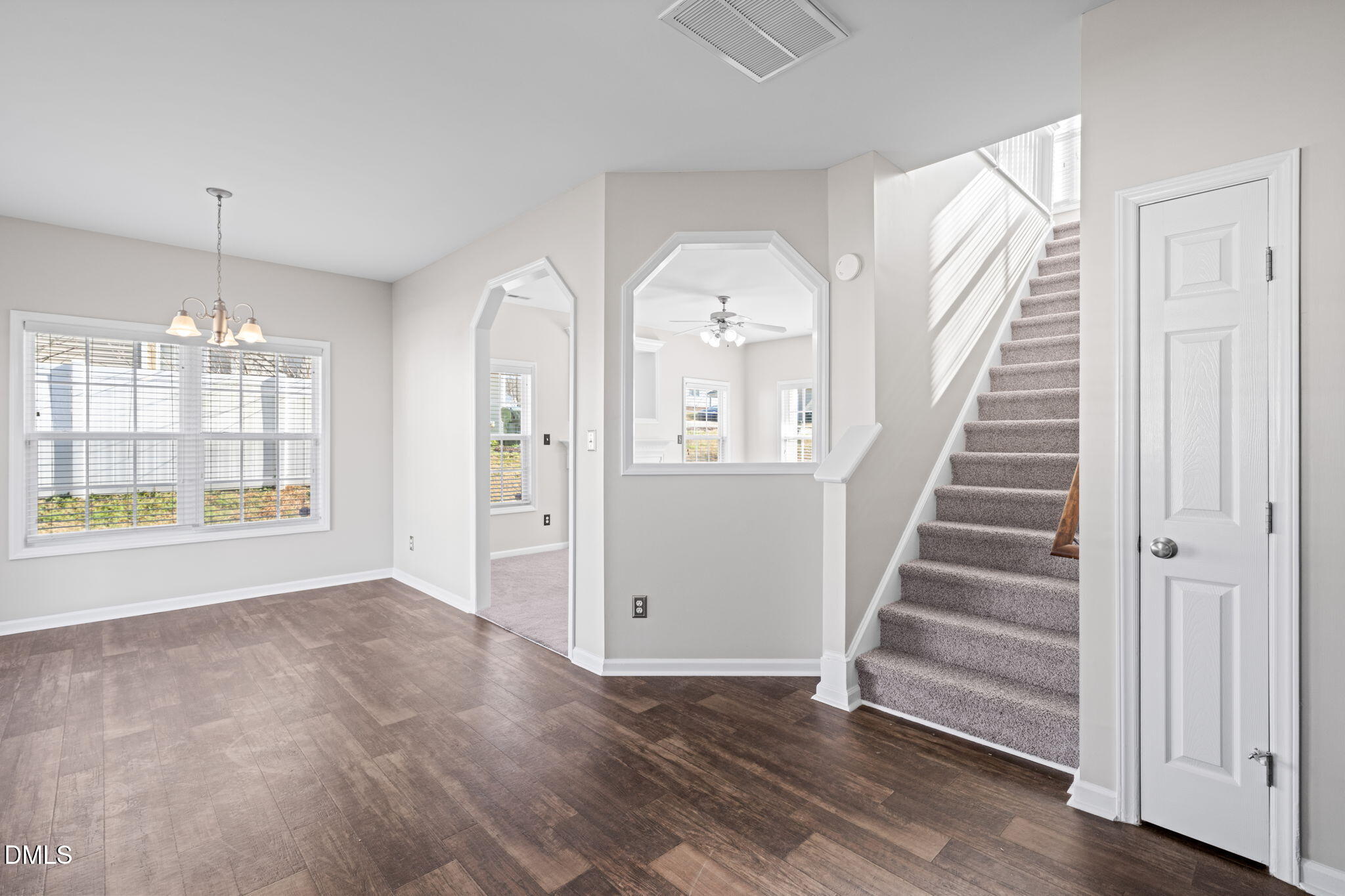 4112 Bay Rum Lane Raleigh, NC 27610 - Photo 12 of 43 wooden floor in an empty room with a window