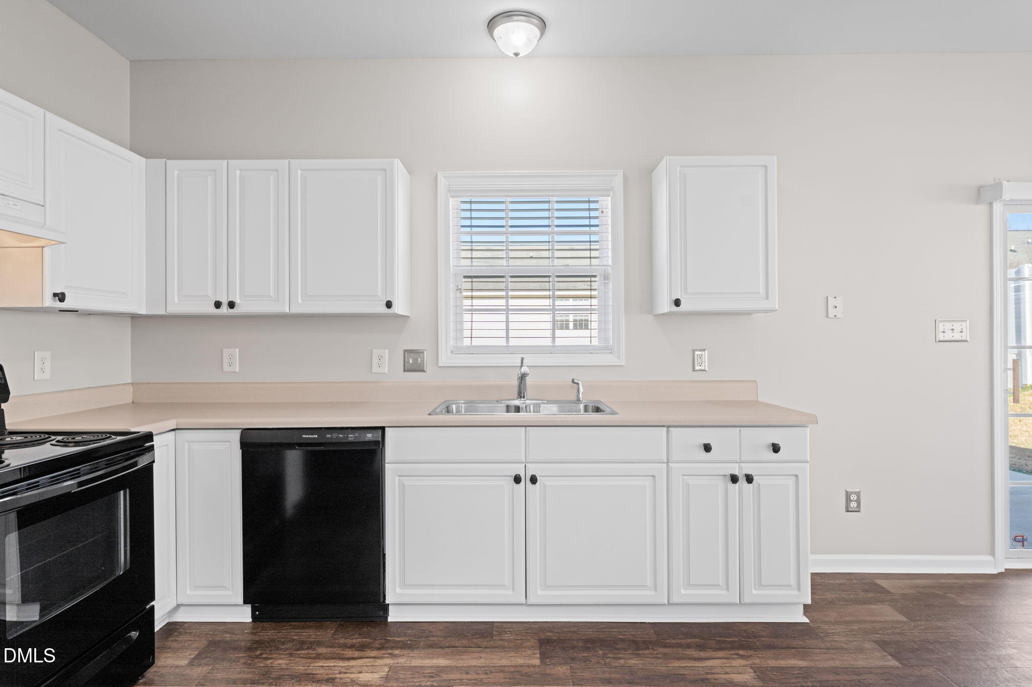4112 Bay Rum Lane Raleigh, NC 27610 - Photo 18 of 43 a kitchen with stainless steel appliances granite countertop a sink and a stove