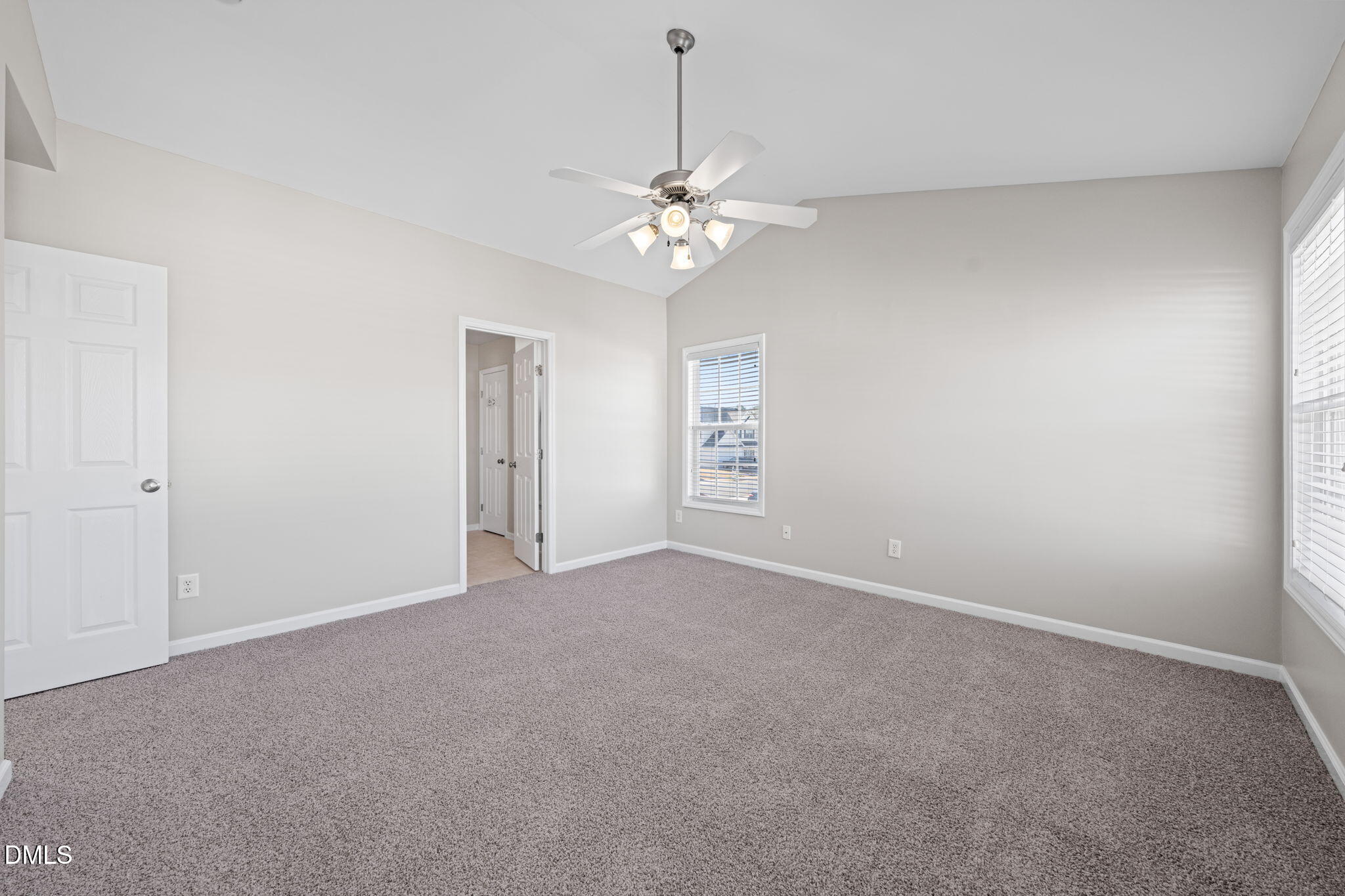 4112 Bay Rum Lane Raleigh, NC 27610 - Photo 23 of 43 a view of an empty room with a ceiling fan
