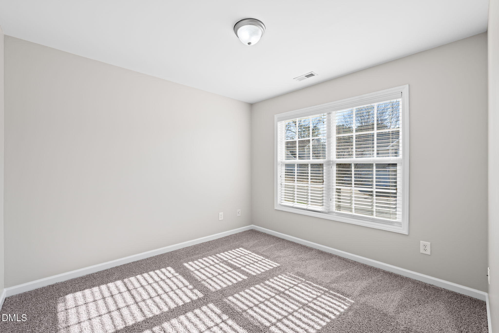 4112 Bay Rum Lane Raleigh, NC 27610 - Photo 29 of 43 a view of an empty room with a window
