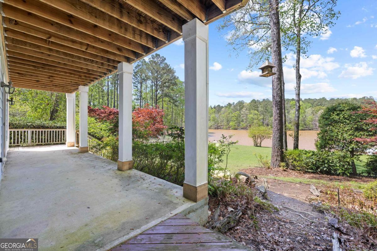 1320 Tal Lewis Road White Plains, GA 30678 - Photo 14 of 19 a view of a porch with garden