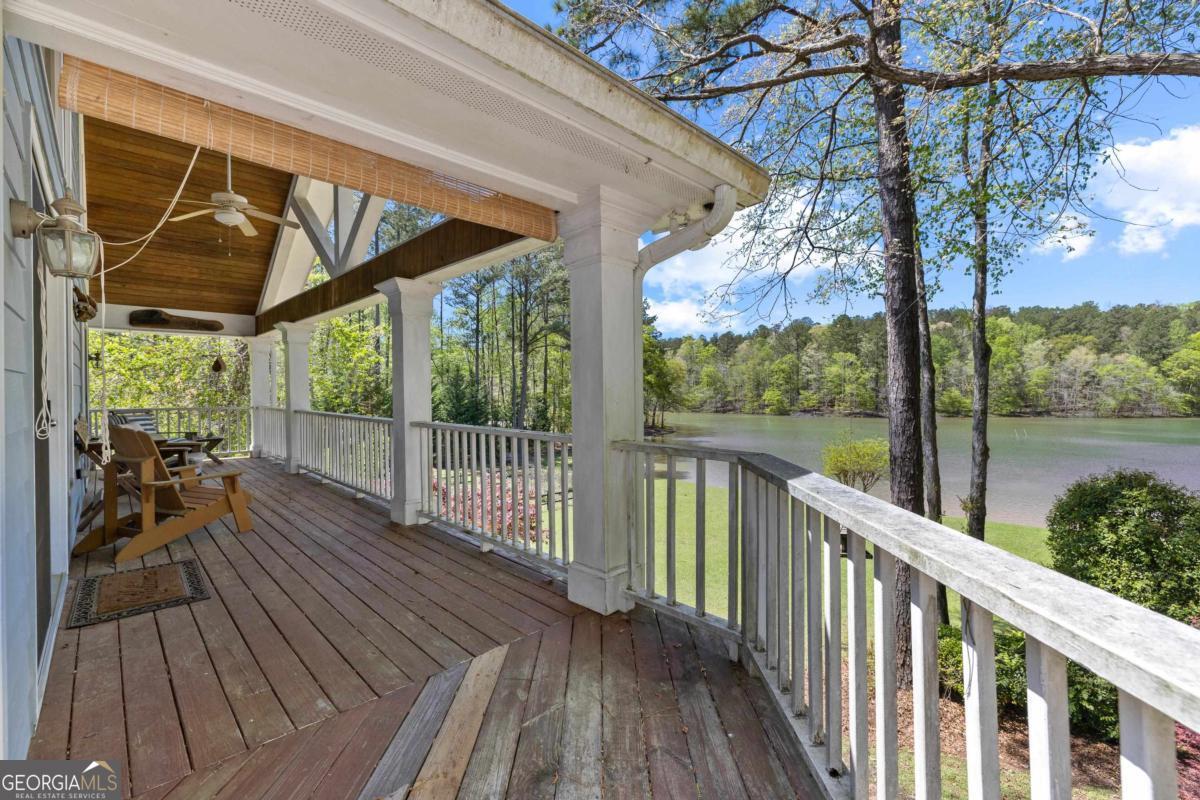 1320 Tal Lewis Road White Plains, GA 30678 - Photo 15 of 19 a view of a porch with wooden floor of the house