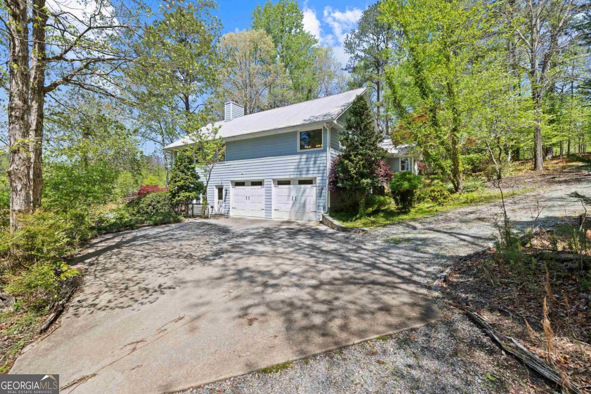 1320 Tal Lewis Road White Plains, GA 30678 - Photo 7 of 19 a view of a house with a yard