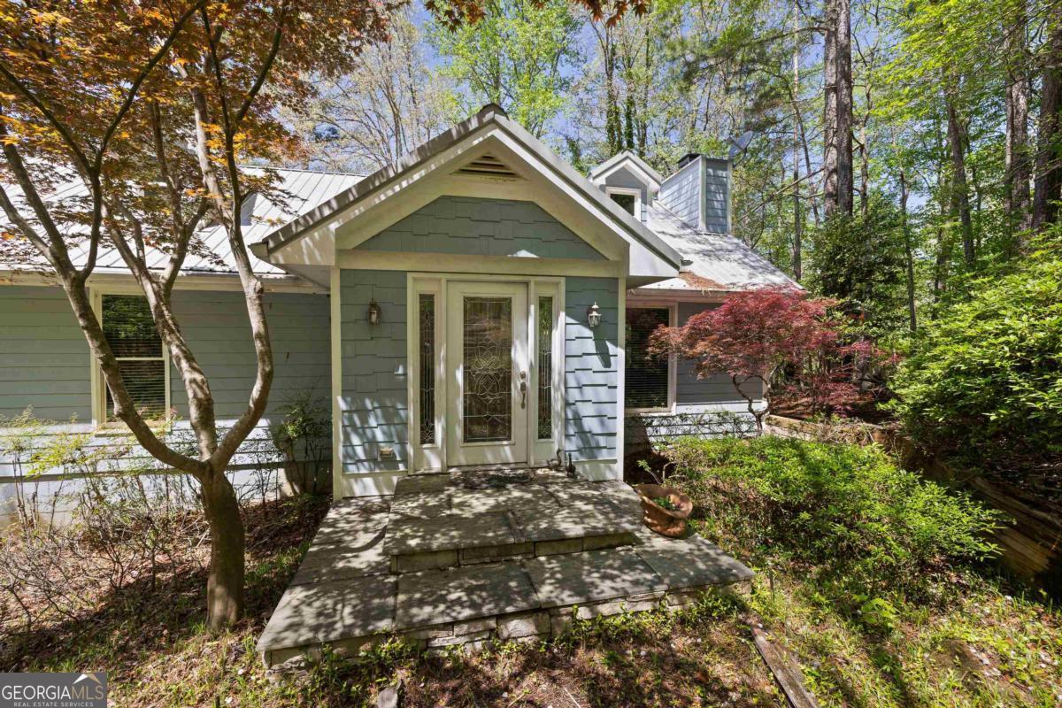 1320 Tal Lewis Road White Plains, GA 30678 - Photo 8 of 19 a front view of a house with garden