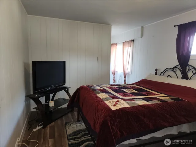 a view of a bedroom with a wardrobe