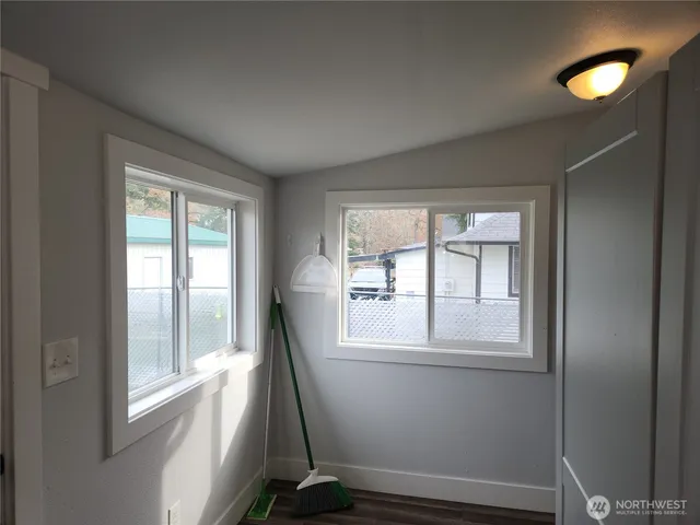 a view of a hallway with staircase