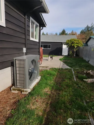 a view of a barn in the back yard