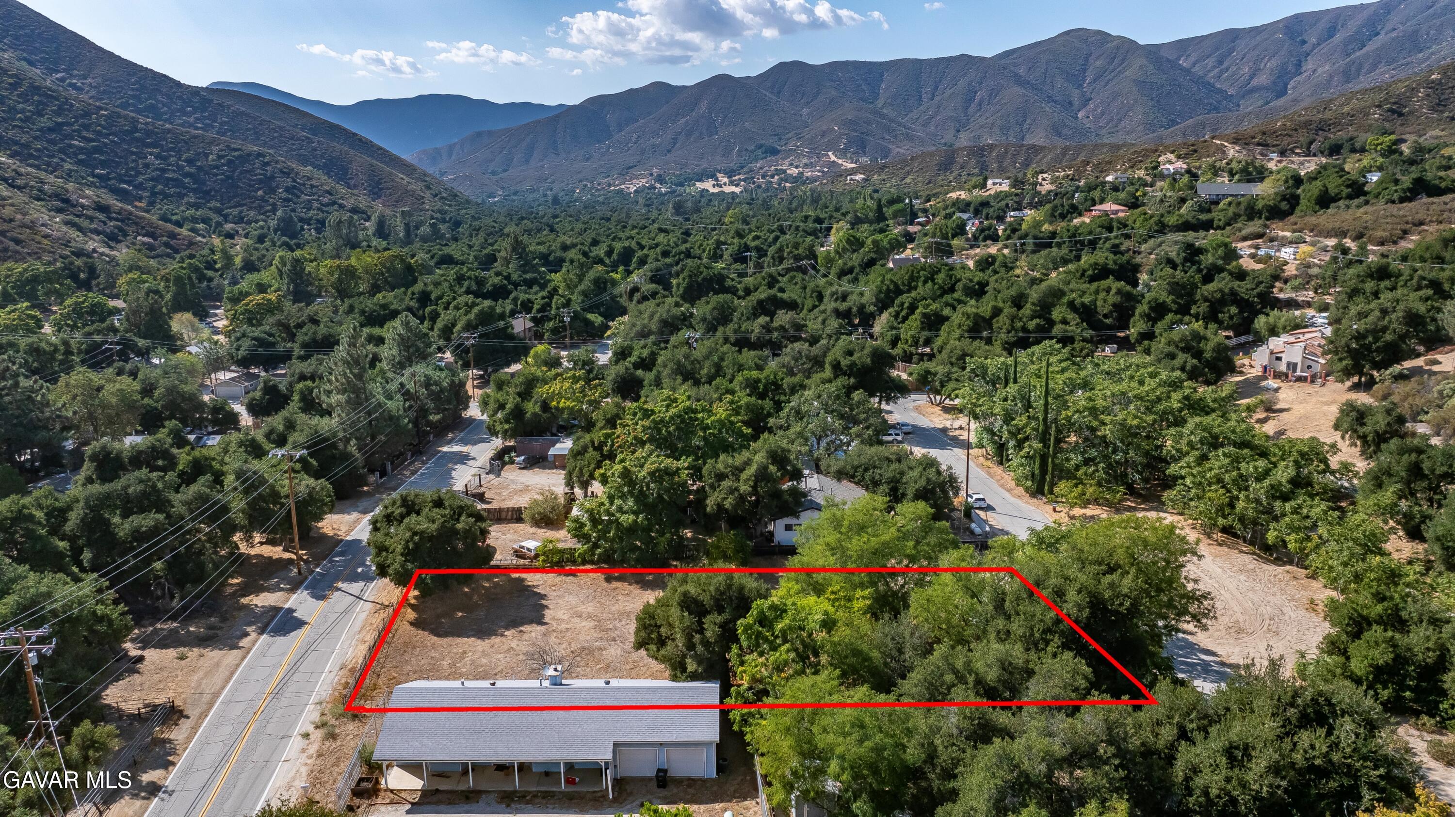 Spunky Canyon Rd Green Valley Green Valley, CA 91390 - Photo 22 of 46 a view of a house with a yard and a large tree