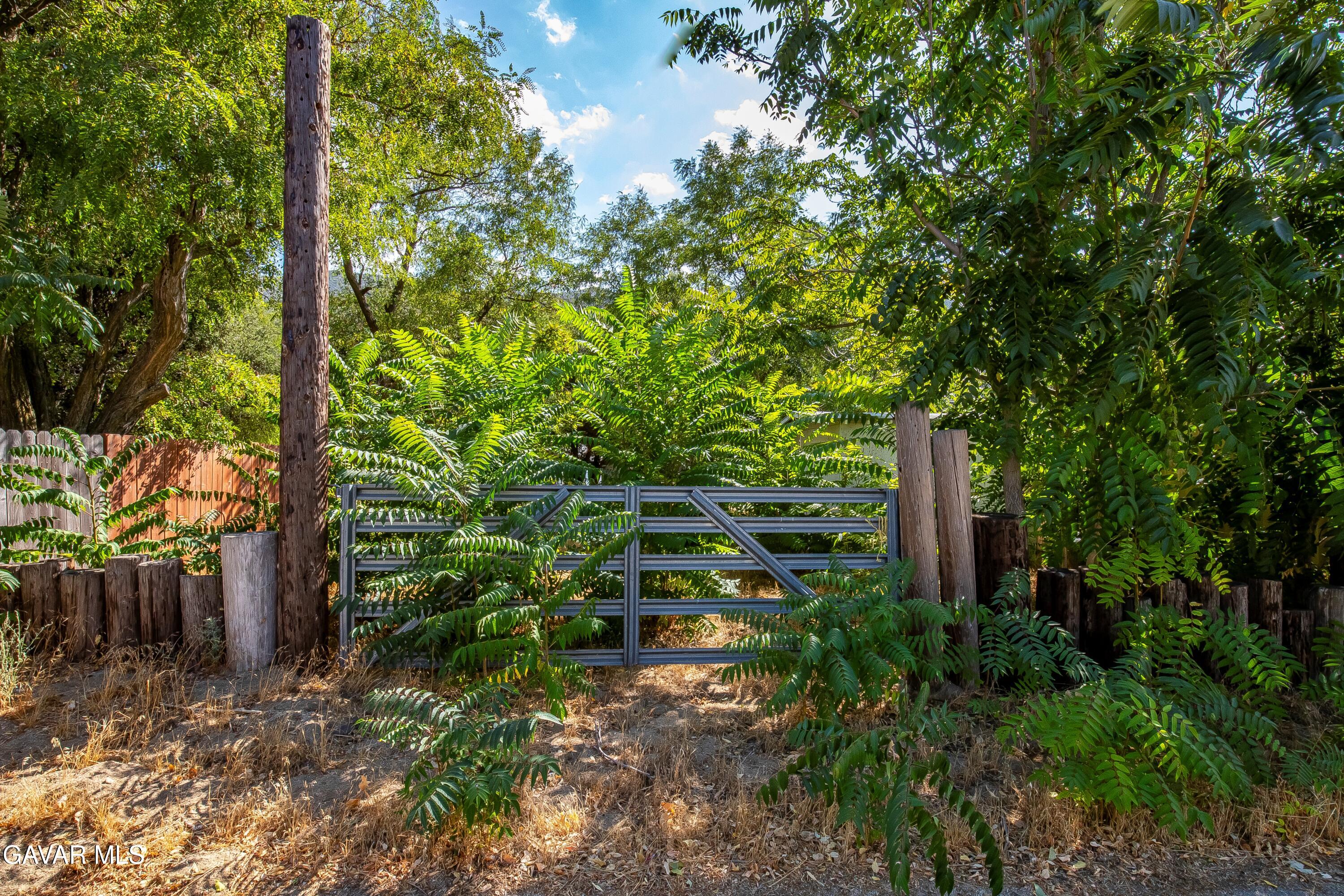 Spunky Canyon Rd Green Valley Green Valley, CA 91390 - Photo 31 of 46 a backyard of a house with lots of green space