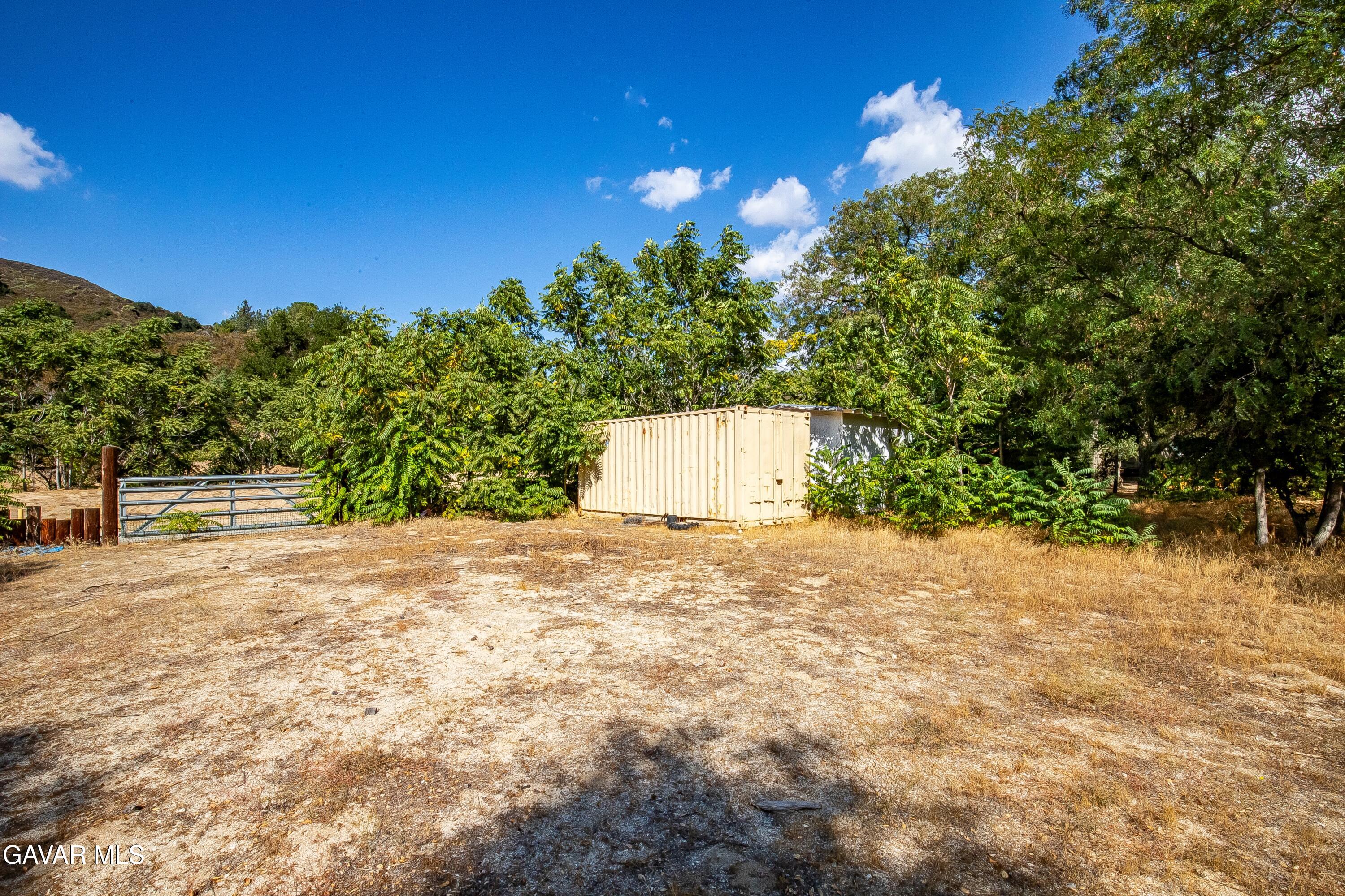 Spunky Canyon Rd Green Valley Green Valley, CA 91390 - Photo 33 of 46 a backyard of a house with lots of green space