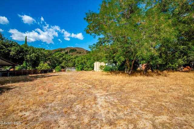 a view of a houses with a yard