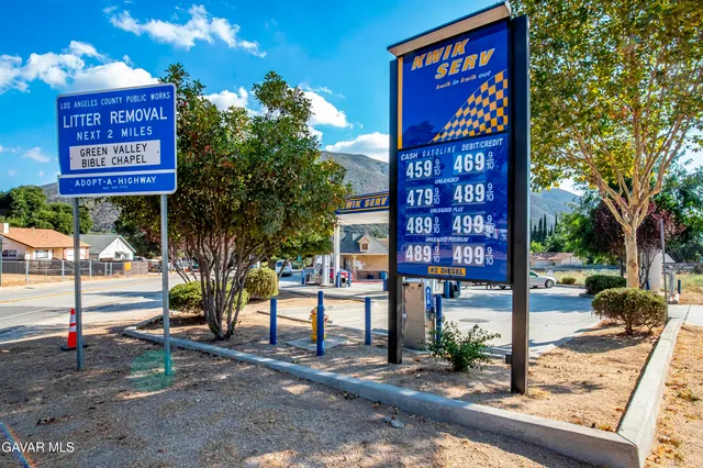 a view of a street with cars